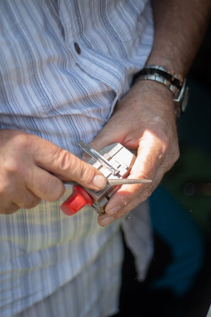 Filing a car key blade